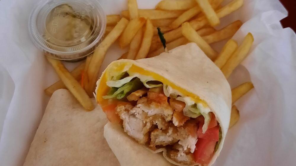 Lisa'S Chicken Strip Wrap · Breaded grilled chicken strips served with tomatoes, lettuce and swiss and american cheese, with side ranch