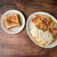 Country Omelette · 3 eggs with sausage topped with coutry gravy, American cheese, green pepper, spanish onions,...