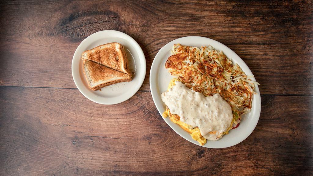 Country Omelette · 3 eggs with sausage topped with coutry gravy, American cheese, green pepper, spanish onions, and hash browns. Served with hashbrowns or 3 pancakes, toast, and jelly.