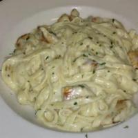 Chicken Fettuccini Alfredo · Grilled chicken smothered in alfredo sauce served with garlic toast. Choice salad or Cole sl...