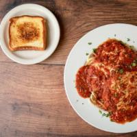 Chicken Parm · Two breaded chicken breasts with pasta and home sauce with garlic toast. Served with choice ...