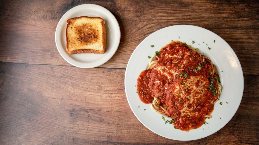 Chicken Parm · Two breaded chicken breasts with pasta and home sauce with garlic toast. Served with choice side salad or Cole slaw