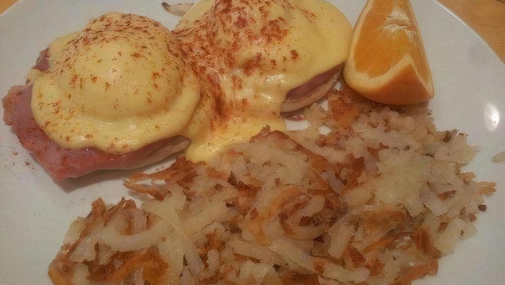 The Classic Bennie · Canadian bacon over a toasted English muffin. Finished with rich hollandaise sauce.