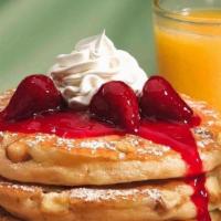 Strawberry Cheesecake Pancakes · Topped with our homemade cheesecake. sauce and fresh strawberries. Sprinkled. with a graham ...