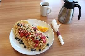 Berry Berry Pancakes · Blueberries and strawberries topped with all-natural granola