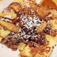 Apple Pecan Crepes · Caramelized apples and roasted pecans rolled into three crepes. Topped with more caramelized...