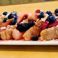Crunchy French Toast · Crunchy French Toast with blueberry and strawberry whip cream