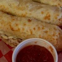 Bread Stix W/ Cheese · Six hand cut breadstix, made every day out of New York Dough. Topped with mozzarella cheese....