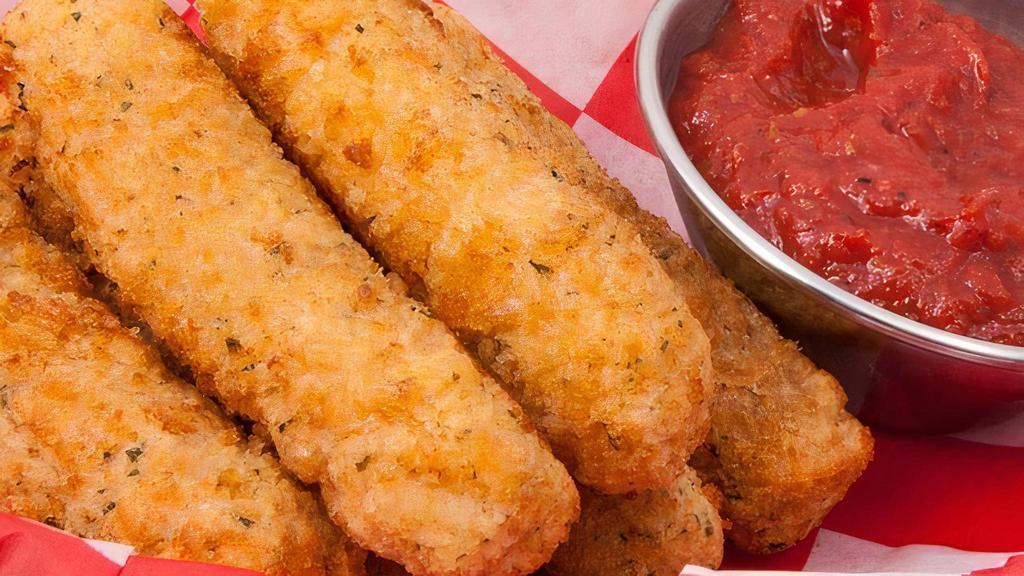 Mozarrella Cheese Stix · Crunch breading covering melted mozzarella cheese stix served with Knolla's famous Ranch or Chicago Pan. Marinara sauce.