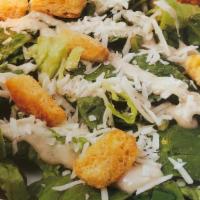 Classic Caesar Salad · Fresh cut lettuce, croutons, parmesan cheese and Caesar dressing.