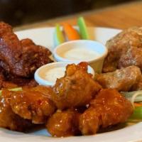 Wings (12 Ct.) · 12 Bone-In Wings with your Choice of Nashville Hot, Garlic Parmesan, Mango Habanero, Sweet T...
