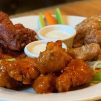 Wings (8 Ct.) · 8 count of Bone-In Wings with your Choice of Nashville Hot, Garlic Parmesan, Mango Habanero,...