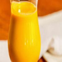 Mango Lassi · Refreshing mango and yogurt drink.
