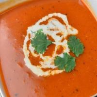 Tomato Soup · Traditional Indian tomato soup with herbs.