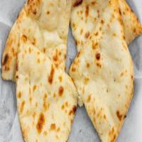 Panner Kulcha · Indian cheese (paneer) and herbs stuffed in wheat flour flat dough baked in tandoor.