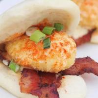 Benny Buns · [2 buns for $10]. panko fried poached egg, candied miso bacon, scallion, chili powder, miso ...