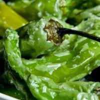 Shishito Peppers · seasonal peppers, mostly mild. served with a lemon wedge