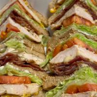 Chicken Club · Chicken, bacon, Swiss and American cheese, lettuce, tomato and mayo.