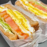 Egg And Cheese · With Lettuce, tomato and mayo.