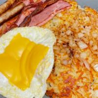Big Mn Breakfast · With three large eggs, ham, two bacon, two sausage, hash browns or grits, toast or two panca...