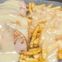 Hot Turkey · With mashed potatoes and chicken gravy.