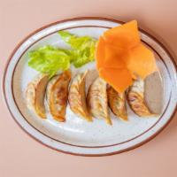 Pork Pot Stickers (6) · Famous Mandarin appetizers made from ground pork or chicken & vegetables wrapped in flour do...