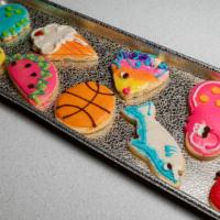 I Dozen Cut Out Cookie · 12 - sugar cookie - iced and decorated (designs vary by season).