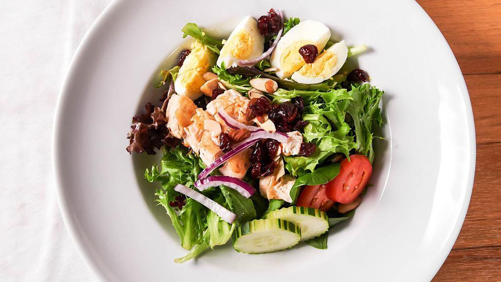 The Zen Salad · Served with hard boiled egg, mixed green, red onion, tomato, cucumbers, and home made ginger dressing.