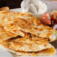 Quesadilla · Grilled onions and peppers, our Mexi-blend cheese, garnished with lettuce Pico de Gallo, sou...