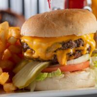 Beef Patty Burger Single · 4oz beef patty with american cheese, mayo, lettuce, onion, side of tomato and pickle. Served...