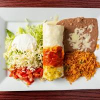 Angel Burrito · Filled with steak or grilled chicken and bacon. Covered with three color sauce. Served with ...