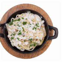 Fettuccine Alfredo · Our Creamy Alfredo Sauce Tossed with a Fettuccine Noodle, Chicken Breast, and topped with Fr...