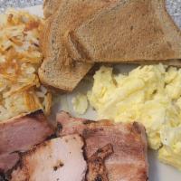 All Day Breakfast Special · Two eggs, one choice of meat, ham, bacon, or sausage, with hash browns and toast.