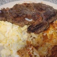 Steak And Eggs · 10 ounce Ribeye Steak with 2 eggs any style, hash brown, and toast