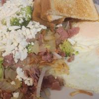 Meaty Hippie Breakfast · With homemade corned beef, two eggs any style and toast.
