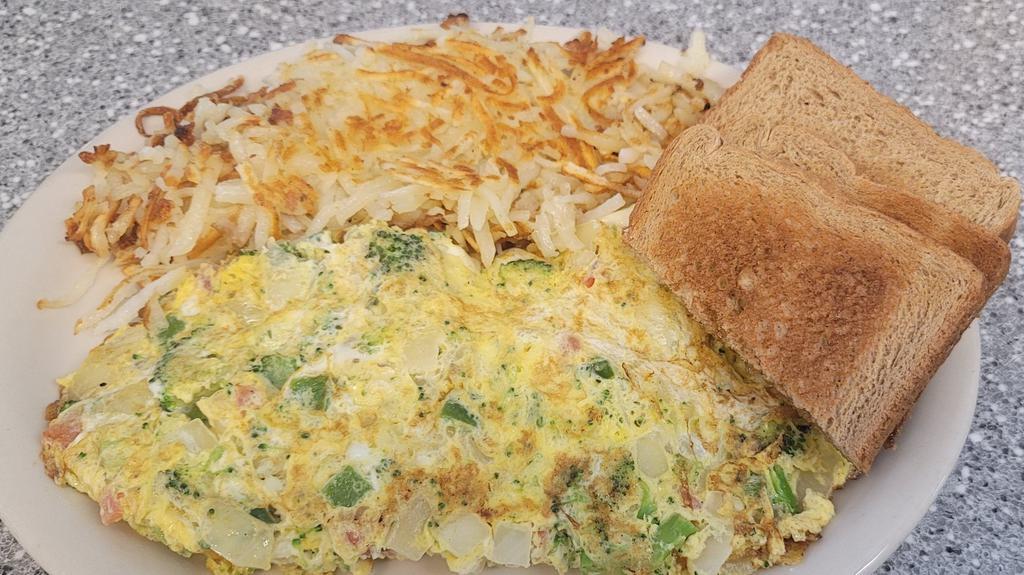 Veggie Omelette · Onions, Tomatoes, Green Pepper, & Broccoli. Hash browns included.