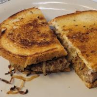 Patty Melt · With Swiss cheese and grilled onions on rye.