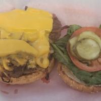 Half & Half Burger With Cheese · Half and half burger onions are grilled made with 50% ground bacon and 50% ground beef  WITH...