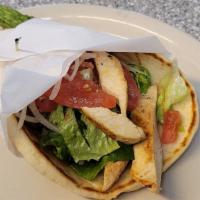 Grilled Chicken Pita · With lettuce, onions, and tomatoes.