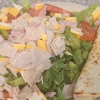 Large Chef Salad · Ham, turkey, lettuce, tomatoes, green peppers, onions, , American and Swiss cheese. Served w...