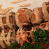 Crunchy Roll · Cooked shrimp. Crab stick and cream cheese, lightly fried with bread crumbs, rolled with ric...