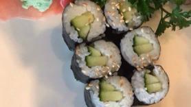 California Roll · Crab stick cucumber, avocado and caviar, rolled with rice and seaweed.