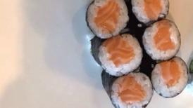 Salmon Roll · Salmon rolled with rice and seaweed.
