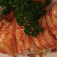 Home Depot Roll · Topped with fresh salmon, tempura flake, and special sauce shrimp tempura and cream cheese, ...