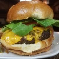 Park Street Pub Burger · 8oz beef patty, choice of cheese, lettuce, tomato, onion on brioche, choice of side