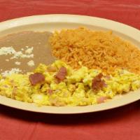 Huevos With Bacon · Two eggs with bacon served with rice. beans and cheese.