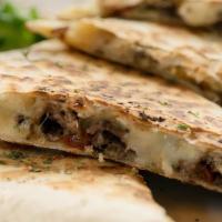 Quesadilla (No Rice, No Beans) · Grilled tortilla with melted cheese inside and meat.