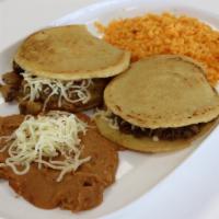 Gordita Dinner · Two gorditas of your choice served with rice and beans.