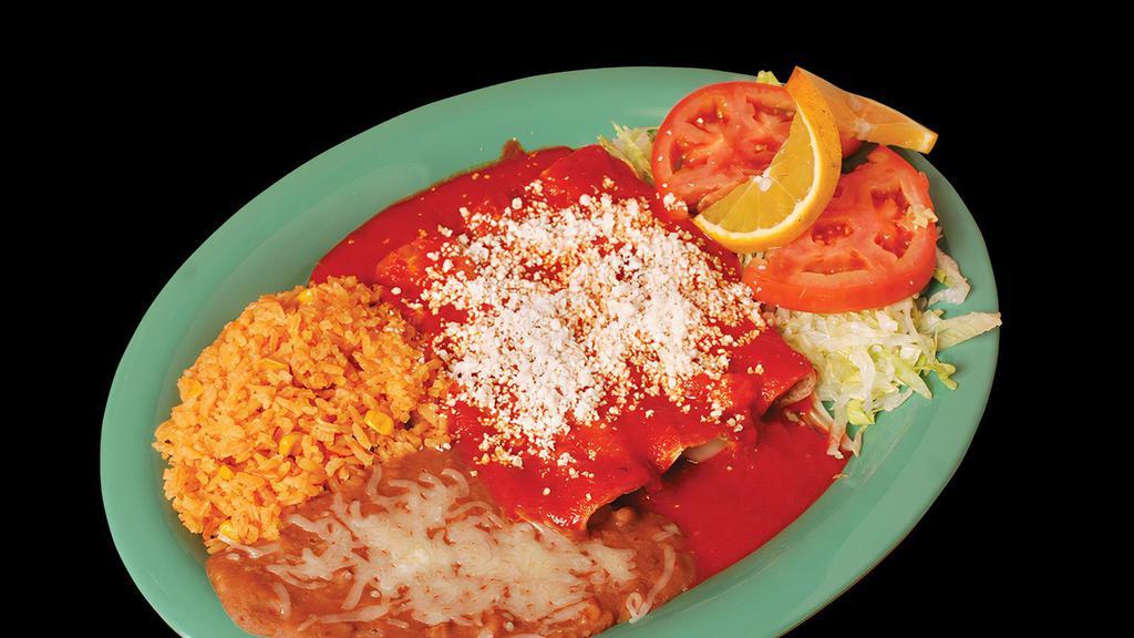 Enchiladas Rojas · Three soft rolled tortilla stuffed with your choice of cheese or chicken and smothered in a red mild sauce.