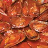 Mejillones Estilo Nayarit · Mussels in special Nayarit sauce.